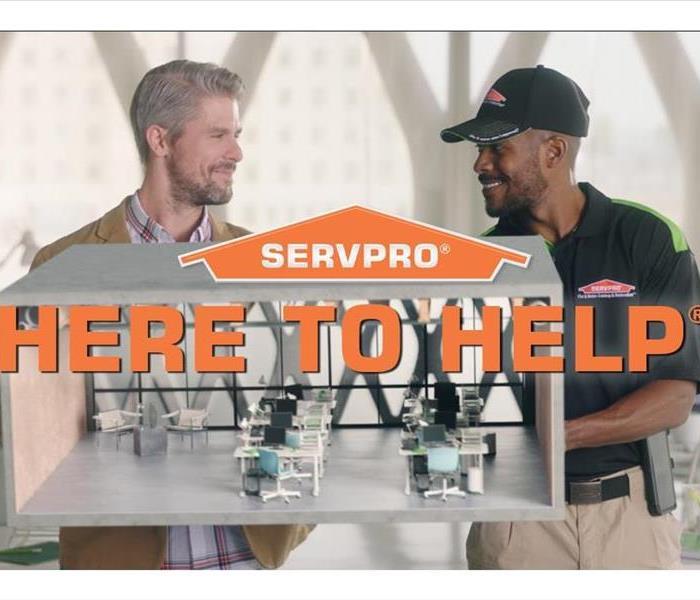 A business owner and a SERVPRO tech come together to keep the business clean and open